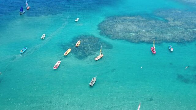 Aerial images of boats and beach
