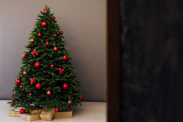 Christmas tree with gift decor for the New Year holiday winter place for inscription
