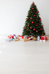 Christmas tree with gift decor for the New Year holiday winter place for inscription