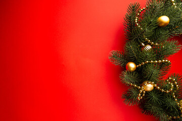 Christmas holidays composition on red background with copy space for your text