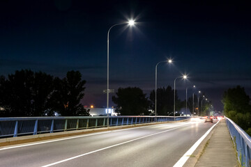 modern LED streetlight on the road bridge at night - 388091269