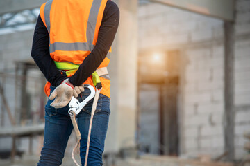 Construction worker working in the new house under construction.