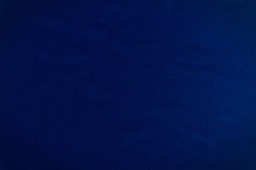 Surface of dark navy blue fabric for background.