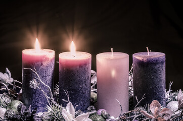 advent decoration with two burning candles - 388094444