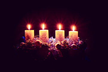 golden advent candles burning religious concept