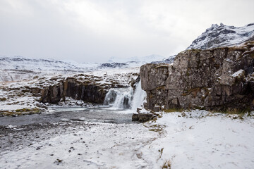 winter landscape with Kirkjufellsfoss in Iceland