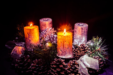 two burning candles on advent wreath