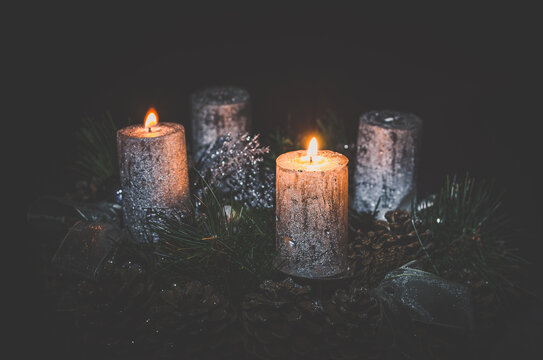 two burning candles on advent wreath