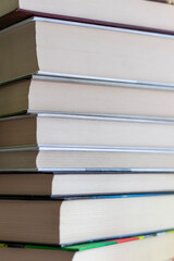 Close-up of a pile of books. Education, learn, study, knowledge and wisdom concept.