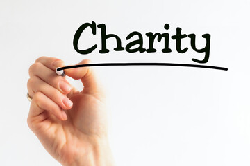Hand writing inscription Charity with marker, concept, stock image