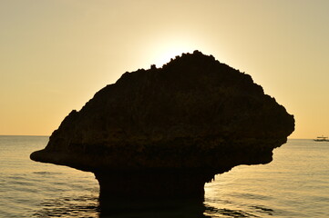 Sunset over the stunning beaches of the island of Boracay and hiking at the Taal Volcano lake in...