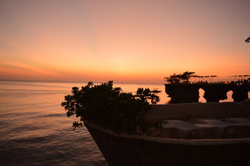 Sunset over the stunning beaches of the island of Boracay and hiking at the Taal Volcano lake in...