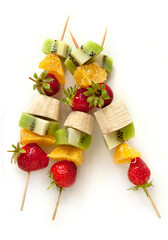 Fresh Fruit Skewers on the white background
