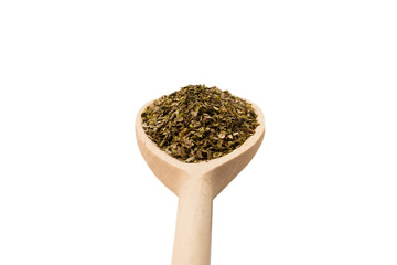 Oregano spice in wooden spoon isolated.