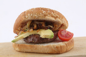 burger with gorgonzola, onion tomato cherry and avocado