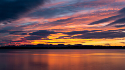 Fototapeta na wymiar sunset blur reflection colorful sky clouds landscape