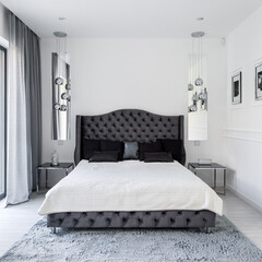Glamour style bed in white bedroom