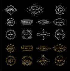 Obraz premium Set of shiny gold and white geometric vintage labels with the place for text.