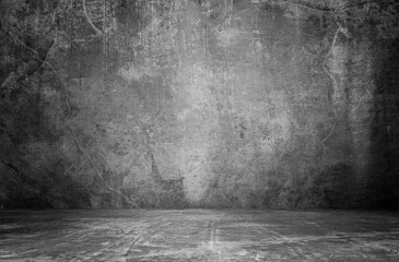 empty room with a concrete wall, gray background. Room for studio.