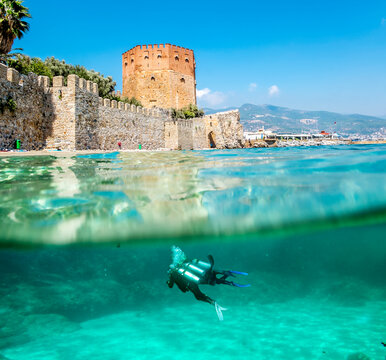 View of the walls of the ancient fortress and the tower of Kyzyl Kule in Alanya in Turkey