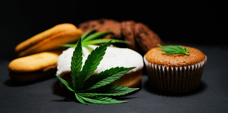 Cannabis Food Banner. CBD Oil Sweets Donut, Cake, Cookies. Marijuana Edibles. Medical Use. Black Background. 