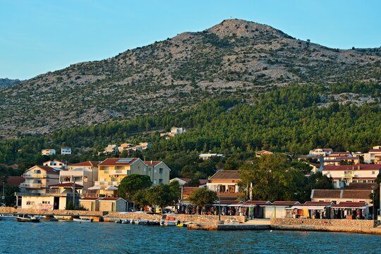Croatia-view of a the harbor in town Starigrad at sunset