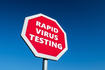 Stop for Rapid COVID-19 Virus Testing transportation sign in perspective view