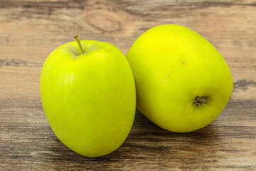 Two ripe green sweet apples