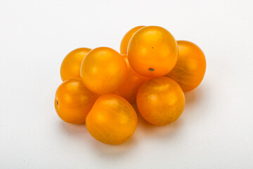 Fresh yellow cherry tomato heap