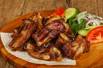 Grilled pork ribs barbeque with vegetables