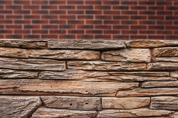 Stone wall on a brick wall background - exterior decoration