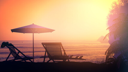 Tropical resort beach against a sunset background.