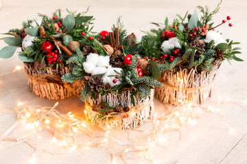 Christmas decoration with carnations, chrysanthemums santini, brunia and fir.
