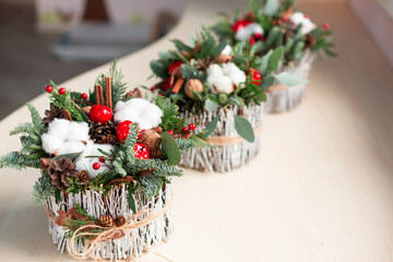 Christmas decoration with carnations, chrysanthemums santini, brunia and fir.