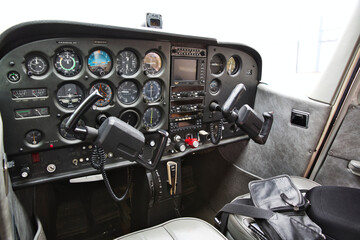 cockpit detail. Cockpit of a small aircraft - obrazy, fototapety, plakaty