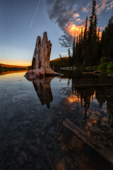 Beautiful Scenery by the lake in Canadian Nature. Moody Sunset Artistic Render. Taken near Whitehorse, Yukon, Canada.