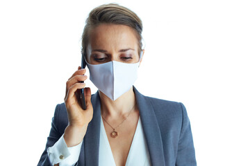 elegant business woman in grey suit on talking on phone