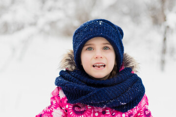 Portrait of little girl outdoor in winter