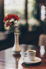 cup of coffee and flowers
