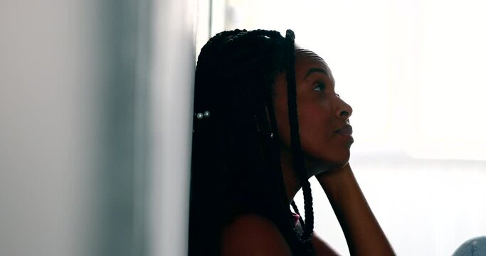 Pensive African black woman in desperate times
