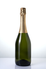 Alcoholic background, champagne without label on a light background. Concept of Festive alcoholic beverages.