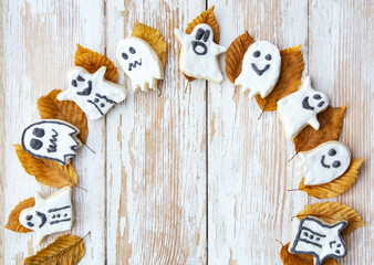 Halloween Jack o Lantern cookies, pumpkin, ghost, black cat, witch hat. Trick or Treat background