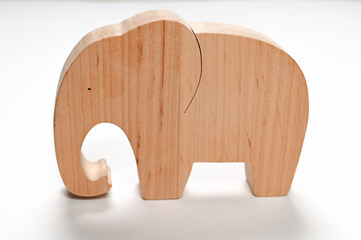 flat wooden elephant on white background