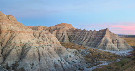 Panorama of the Eroded Landscape of Badlands National Park at Sunset