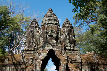 Stone faces at east gate of Bayon Temple in Cambodia