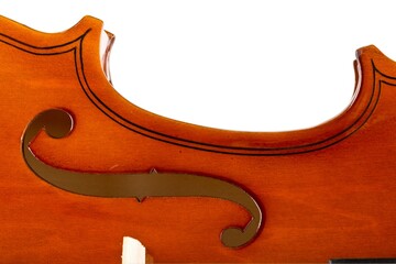 Close up macro of F hole on brown wooden fiddle or violin, classic musical instrument, isolated on white background