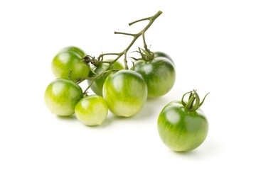 Bundle of unripe green tomatoes over white background
