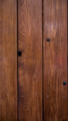 Wood door background, vertical texture, brown material