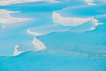 Pamukkale travertines pools and terraces. Denizli, Turkey. Natural site of hot springs and travertines, terraces of carbonate minerals.