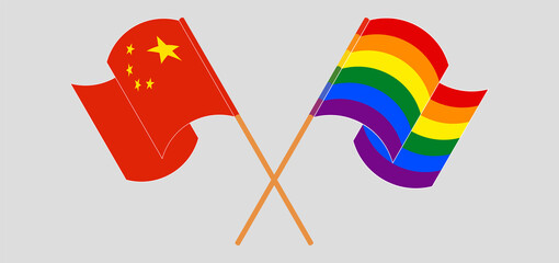 Crossed and waving flags of China and LGBTQ